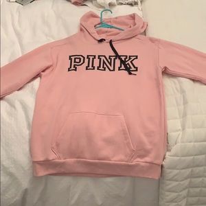 Pink pink colored over sized sweatshirt.